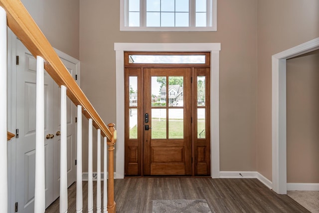 102 Six Point Ct, Goose Creek, SC 29445 - foyer entrance featuring dark wood-style floors, a high ceiling, baseboards, and stairs