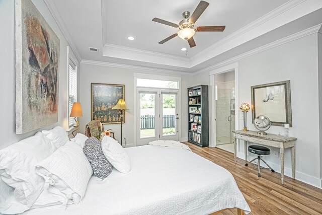 1515 Pogonia St Unit 2, Mount Pleasant, SC 29466 - bedroom featuring wood finished floors, access to exterior, a tray ceiling, ornamental molding, and baseboards