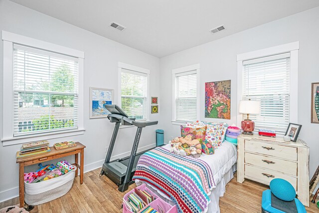 1515 Pogonia St Unit 2, Mount Pleasant, SC 29466 - bedroom featuring light wood-type flooring and baseboards