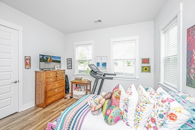 1515 Pogonia St Unit 2, Mount Pleasant, SC 29466 - bedroom with wood finished floors and baseboards