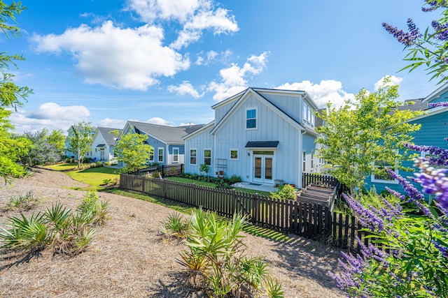 1515 Pogonia St Unit 2, Mount Pleasant, SC 29466 - view of front facade with board and batten siding and french doors
