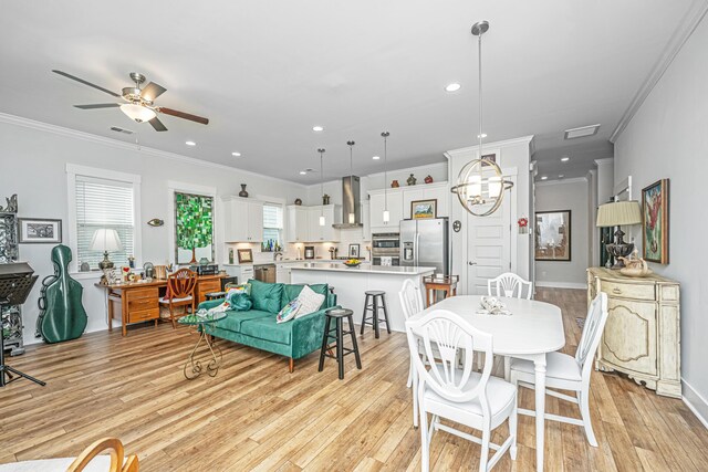 1515 Pogonia St Unit 2, Mount Pleasant, SC 29466 - dining area with ornamental molding, light wood-type flooring, ceiling fan, recessed lighting, and baseboards