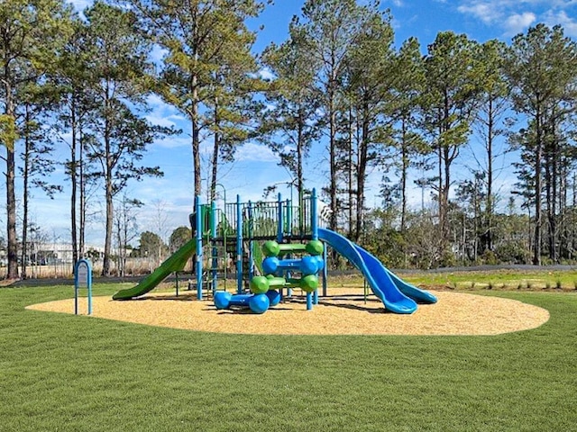 community playground featuring a yard