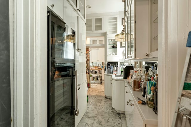 interior space featuring marble finish floor
