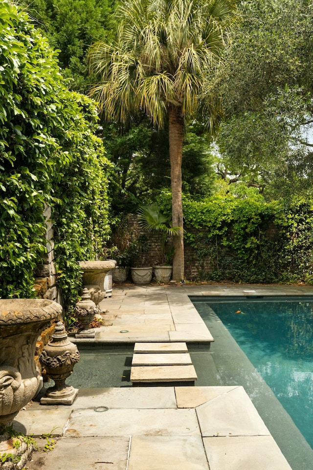 pool with a patio