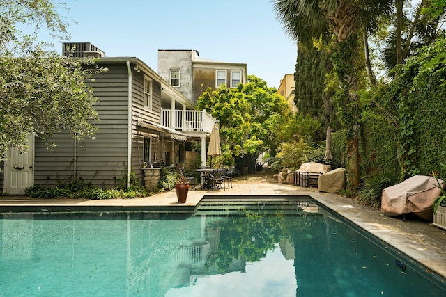 pool with a patio