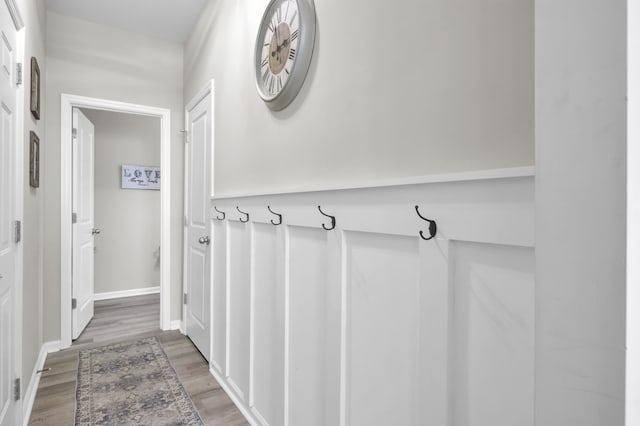 mudroom featuring wood-type flooring