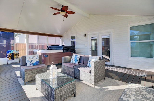 wooden terrace with ceiling fan, an outdoor hangout area, and a hot tub