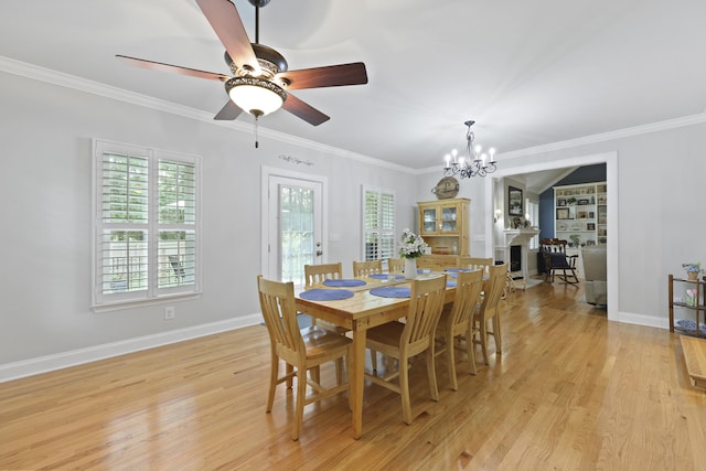 189 Fox Chase Dr, Goose Creek, SC 29445 - dining space featuring ornamental molding, a chandelier, light wood-style flooring, a ceiling fan, and baseboards