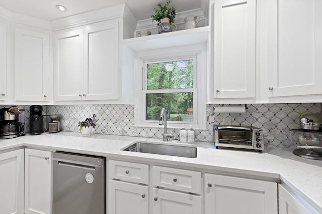 189 Fox Chase Dr, Goose Creek, SC 29445 - kitchen featuring a sink, dishwasher, white cabinetry, and tasteful backsplash