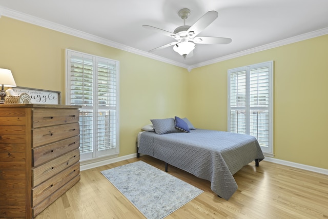 189 Fox Chase Dr, Goose Creek, SC 29445 - bedroom featuring crown molding, light wood-style floors, baseboards, and ceiling fan