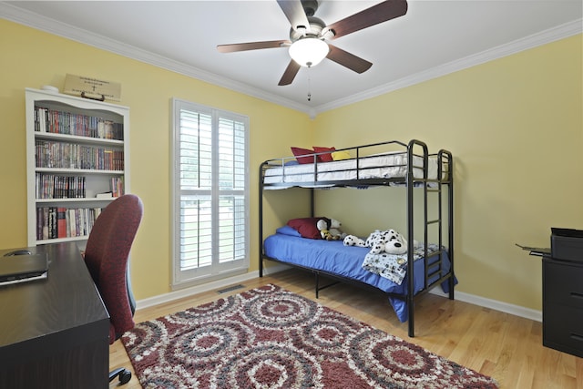 189 Fox Chase Dr, Goose Creek, SC 29445 - bedroom with wood finished floors, crown molding, baseboards, a ceiling fan, and a desk