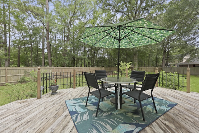 189 Fox Chase Dr, Goose Creek, SC 29445 - deck featuring outdoor dining area and view of scattered trees