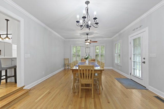 189 Fox Chase Dr, Goose Creek, SC 29445 - dining area featuring light wood-style flooring, a chandelier, baseboards, and crown molding