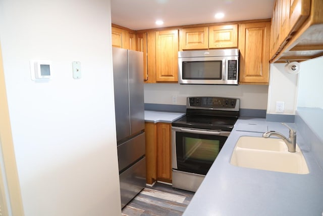 kitchen with sink and stainless steel appliances