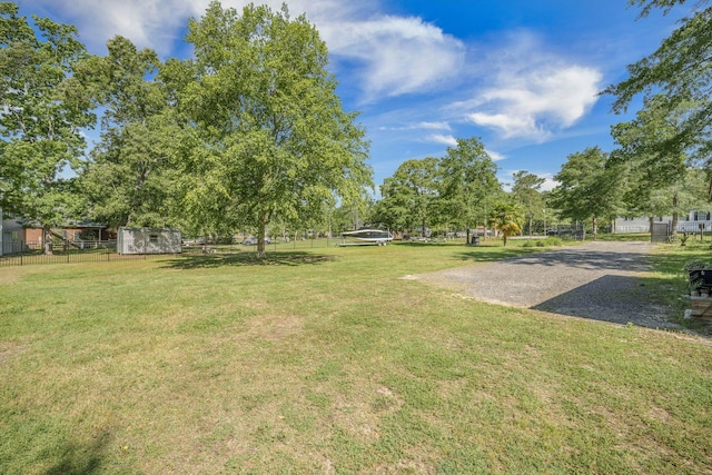 view of yard with a shed and an outdoor structure