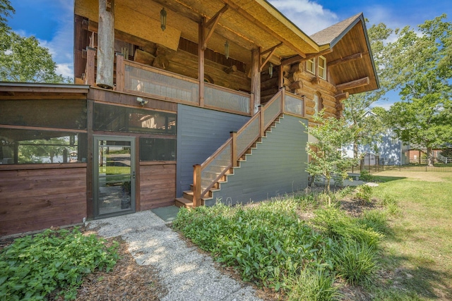 entrance to property with log siding