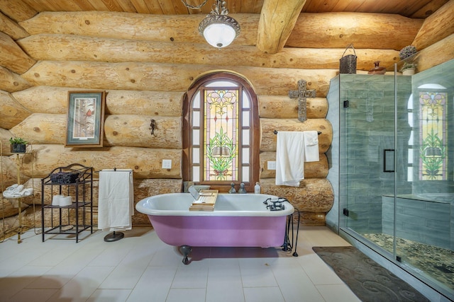 bathroom featuring a stall shower, wooden ceiling, rustic walls, a freestanding bath, and beam ceiling