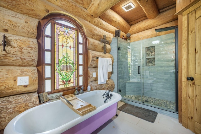 bathroom with plenty of natural light, a stall shower, a soaking tub, beam ceiling, and tile patterned flooring