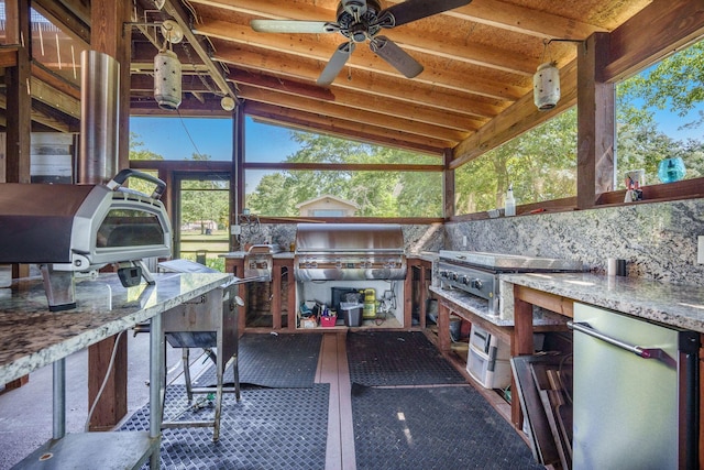 view of patio / terrace featuring area for grilling, a ceiling fan, and a grill