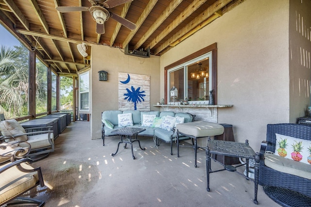 view of patio / terrace with ceiling fan and an outdoor hangout area