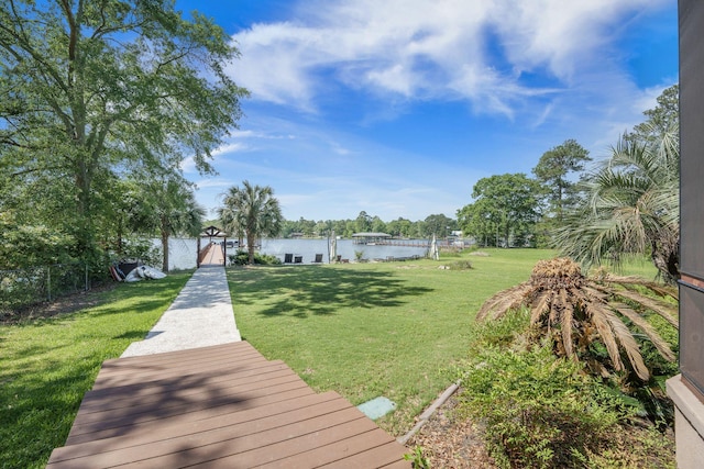 surrounding community featuring a water view