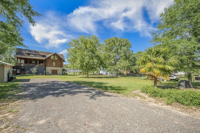 view of dirt / gravel driveway