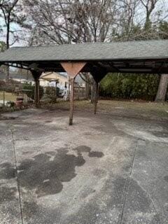 view of car parking featuring a carport