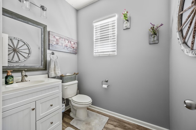 9009 Chato Ct, Summerville, SC 29483 - bathroom featuring toilet, wood finished floors, vanity, and baseboards