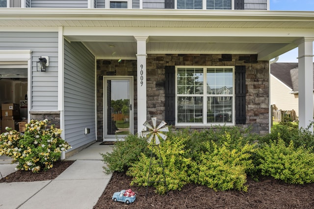 9009 Chato Ct, Summerville, SC 29483 - property entrance featuring stone siding and a porch