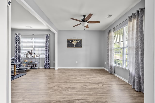 9009 Chato Ct, Summerville, SC 29483 - unfurnished room featuring a ceiling fan, plenty of natural light, and wood finished floors