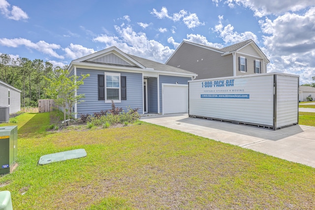 view of front facade featuring a garage, driveway, a front lawn, central AC unit, and board and batten siding