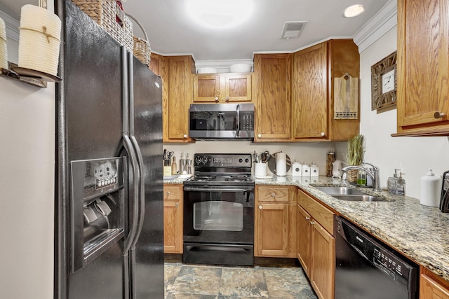 kitchen with black appliances, crown molding, sink, and light stone counters