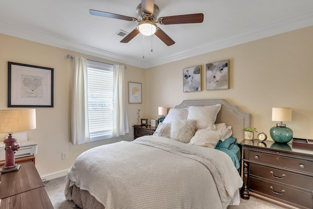 bedroom with light carpet, ceiling fan, and crown molding