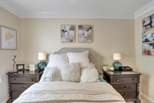 bedroom featuring carpet flooring and ornamental molding