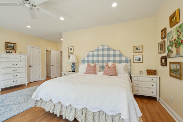 bedroom featuring a ceiling fan, light wood-type flooring, baseboards, and recessed lighting