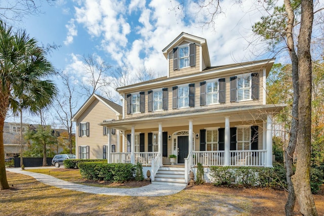 view of front of home featuring covered porch