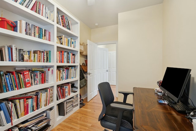 home office featuring light wood-style floors