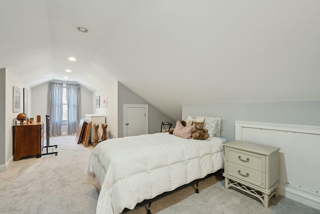 bedroom with recessed lighting, vaulted ceiling, and light colored carpet