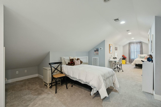 bedroom featuring lofted ceiling, baseboards, visible vents, and light colored carpet