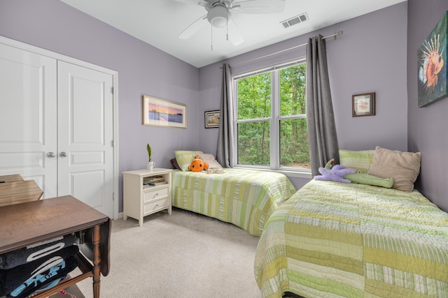 300 Bucksley Ln Unit 102, Charleston, SC 29492 - bedroom featuring light carpet, ceiling fan, and a closet
