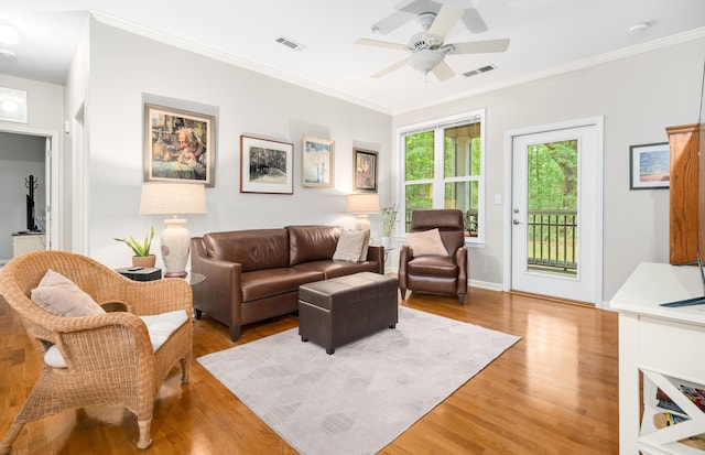 300 Bucksley Ln Unit 102, Charleston, SC 29492 - living area with light wood-style flooring, ceiling fan, crown molding, and baseboards