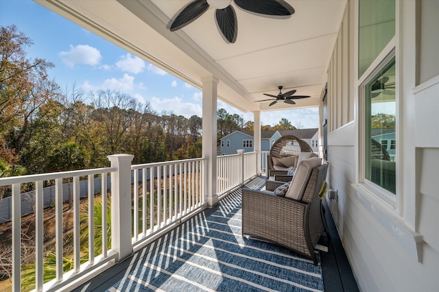 balcony featuring ceiling fan