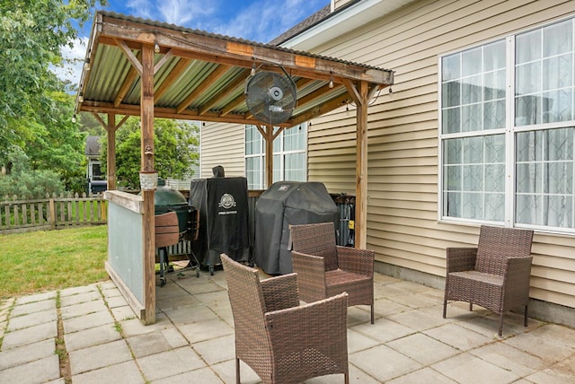 view of patio featuring fence and grilling area