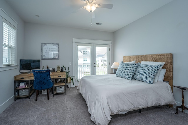 carpeted bedroom with access to exterior, ceiling fan, baseboards, and an office area