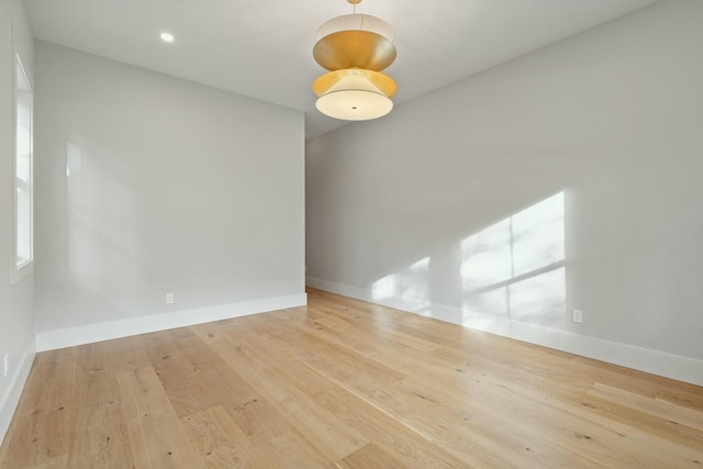 unfurnished room featuring light wood-type flooring