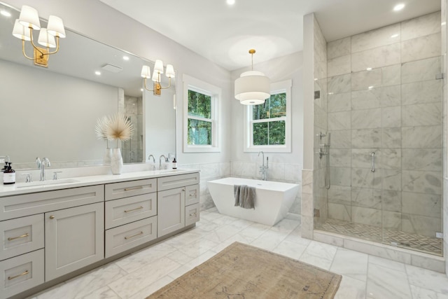 bathroom with plus walk in shower and vanity