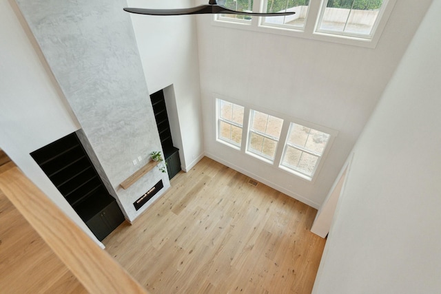 unfurnished living room with light wood-type flooring