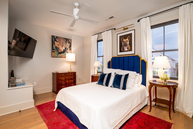 1646 Marsh Harbor Ln, Mount Pleasant, SC 29464 - bedroom with wood finished floors and ceiling fan