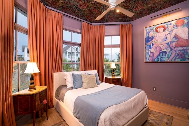 1646 Marsh Harbor Ln, Mount Pleasant, SC 29464 - bedroom featuring wood finished floors and a ceiling fan